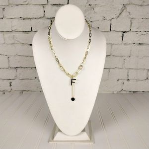 Une Douce F Initial Chain Link Necklace in Gold